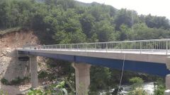 BRIDGE OVER THE LIM RIVER